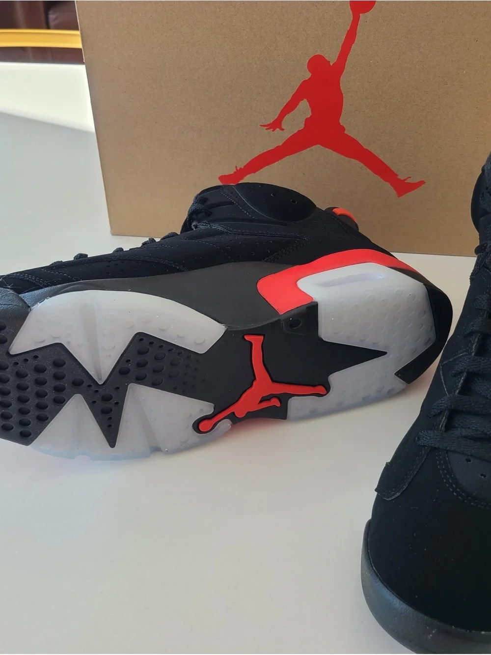 Jordan Kids Black Sneakers with Red Pull Tabs and Multicolor Tongue